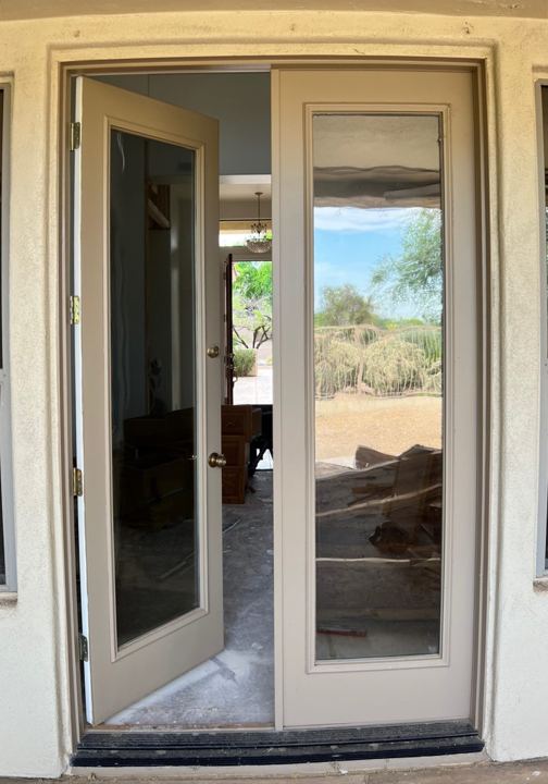 French doors open to the patio