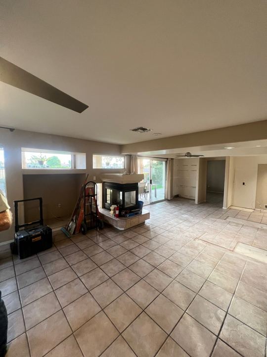 Great room and fireplace before