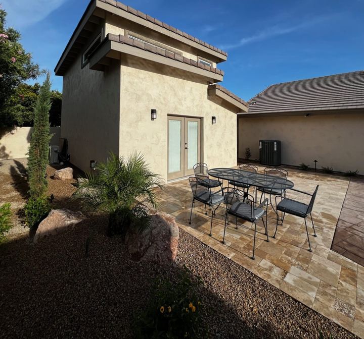 Side with patio and French doors