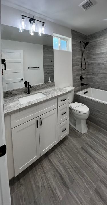 Second bathroom vanity and tub