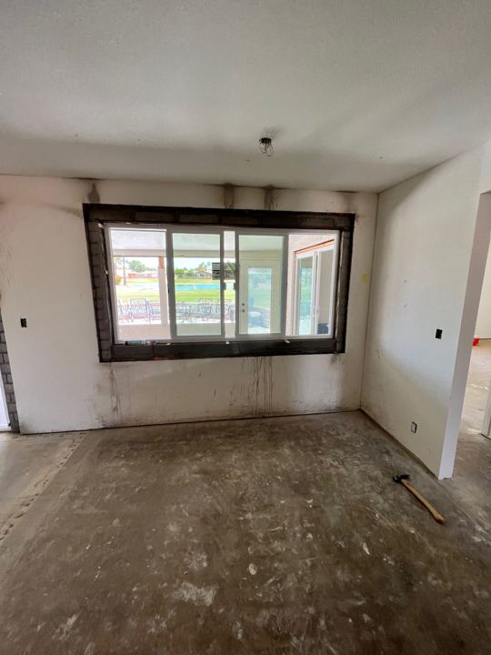 Front room stripped to drywall