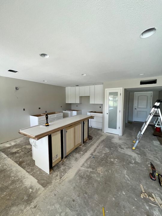 Kitchen cabinets and island going in