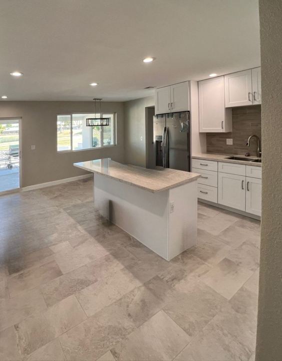 Living room open to the kitchen