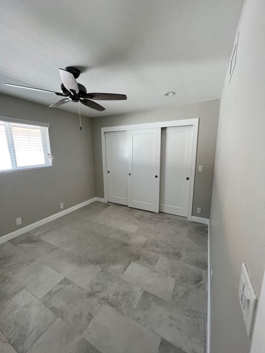 Bedroom with new tile floor