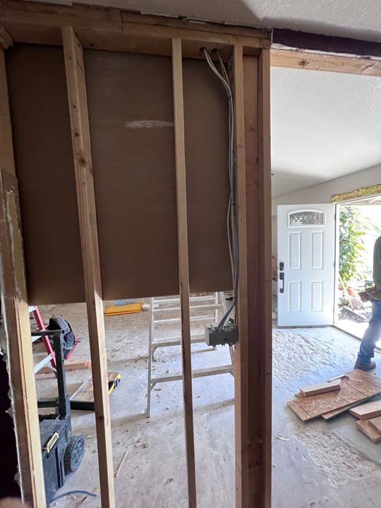 Wall opened to the studs