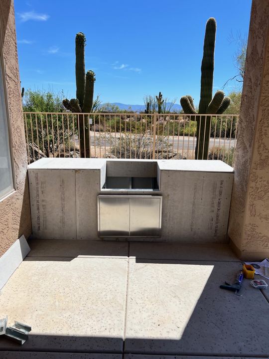 Outdoor kitchen with built-in grill