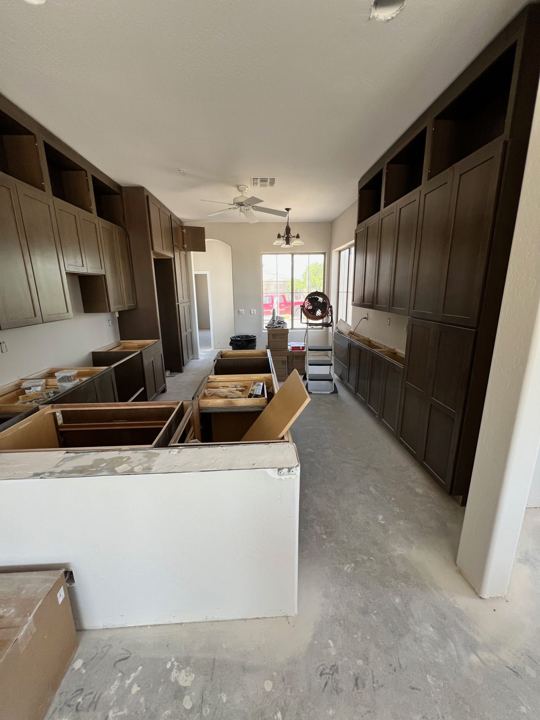 Cabinets and island going in