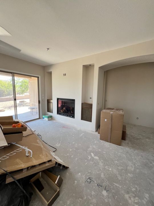 Living room and fireplace wall