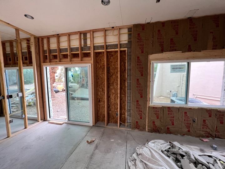 Exterior walls being insulated