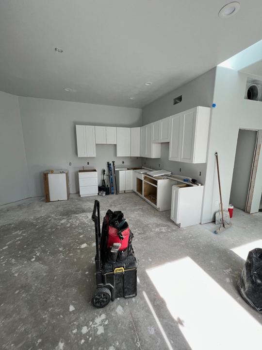 Kitchen cabinets going in