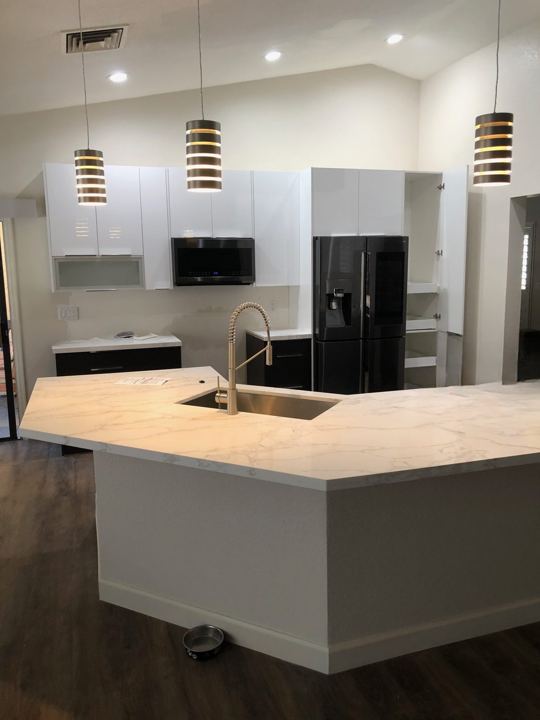 Peninsula, pendants and cabinet wall