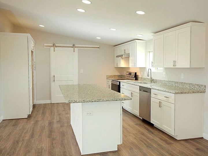 Kitchen with island and barn door