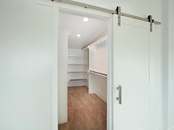 Walk-in closet with barn door